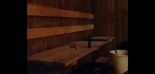  Playing dildo on the sauna